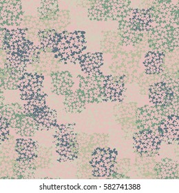 Seamless pattern. Clouts with stars. Random order. Spotted chaos. Fashion camouflage.  Grunge image.