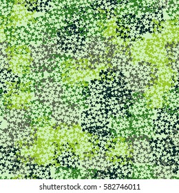 Seamless pattern. Clouts with stars. Random order. Spotted chaos. Fashion camouflage. Grunge image.