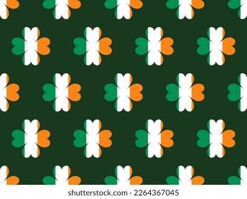 Seamless pattern with clover leaves in the colors of the flag of Ireland. Festive background for Saint Patrick's Day. Design for print, wallpaper and wrapping paper. Vector illustration