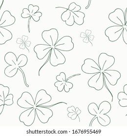 Seamless pattern with clover. The leaves of the clover. Contour background. Vector illustration. Stock vector.