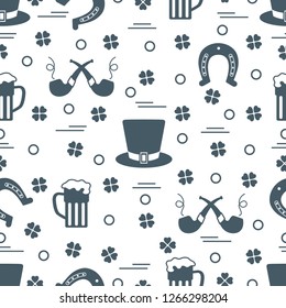 Seamless pattern with clover leaves, horseshoe, beer mug, hat, smoking pipe. St. Patrick's Day. Holiday background. Irish vector pattern. Design for banner, poster, textile, print.