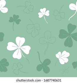 Seamless pattern with clover. The leaves of the clover. Light green seamless pattern. Vector illustration. Stock vector. 