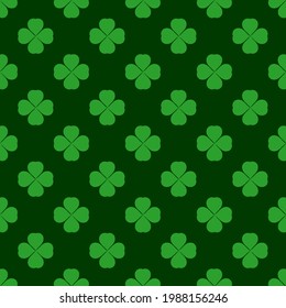 Seamless pattern with clover leaves on green background vector.