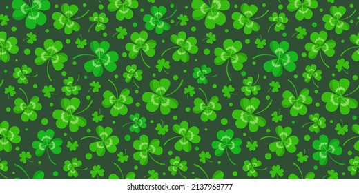 Seamless pattern with clover leaves on dark background. Shamrock with four and three leaves and dots. Vector ornament for Saint Patrick day, traditional Irish holiday with flat green trefoils