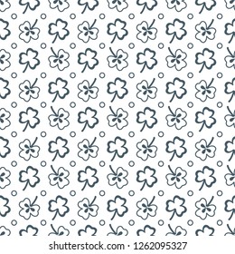 Seamless pattern with clover leaves. Shamrock background. St. Patrick's Day. Design for banner and print.