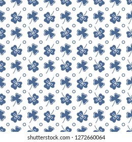Seamless pattern with clover leaves. Shamrock background. St. Patrick's Day. Design for banner and print.