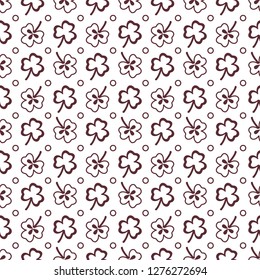Seamless pattern with clover leaves. Shamrock background. St. Patrick's Day. Design for banner and print.