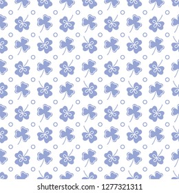 Seamless pattern with clover leaves. Shamrock background. St. Patrick's Day. Design for banner and print.