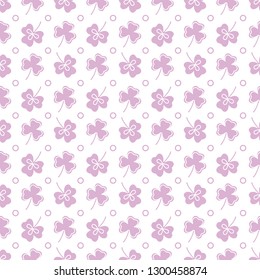 Seamless pattern with clover leaves. Shamrock background. St. Patrick's Day. Design for banner and print.