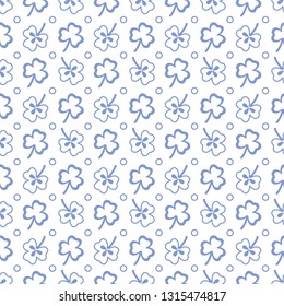 Seamless pattern with clover leaves. Shamrock background. St. Patrick's Day. Design for banner and print.