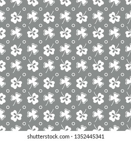 Seamless pattern with clover leaves. Shamrock background. St. Patrick's Day. Design for banner and print.