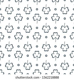 Seamless pattern with clover leaves. Shamrock background. St. Patrick's Day. Design for banner and print.