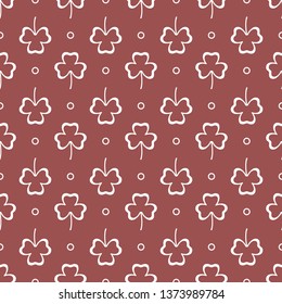 Seamless pattern with clover leaves. Shamrock background. St. Patrick's Day. Design for banner and print.