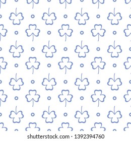 Seamless pattern with clover leaves. Shamrock background. St. Patrick's Day. Design for banner and print.
