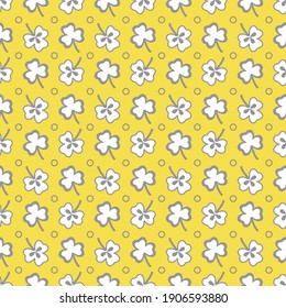 Seamless pattern with clover leaves. Shamrock background. St. Patrick's Day. Design for banner and print. Illuminating and Ultimate Gray.