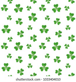 Seamless pattern with clover leaves for St Patrick's Day party. Paper cut style vector illustration. Green and white colours