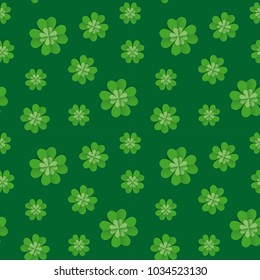 Seamless pattern with clover leaves for St Patrick's Day party. Paper cut style vector illustration. Green and white colours