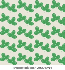 Seamless pattern with clover leaves. Vector graphics