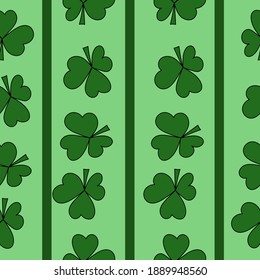 Seamless pattern of clover leaves and vertical dark green stripes on a light green background, a symbol of St. Patrick's Day and good luck illustration
