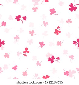 Seamless pattern with clover leaves.Magical plant. Background for St. Patrick's Day. Colorful endless backdrop with trefoils and quatrefoils. Shamrock. Irish story. Vector illustration.