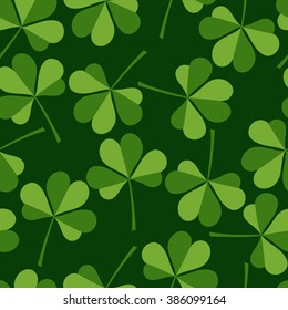 Seamless pattern with clover on a green background. Vector illustration