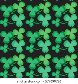 Seamless pattern. clovers leaves on a black background. Vector illustration.