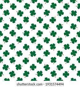 Seamless pattern with clovers on white background