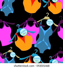seamless pattern coat hanger with a bathing suit, T-shirt  on black vector illustration
