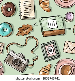 Seamless pattern with coffe cup, vintage camera, croissant, book, doughnuts