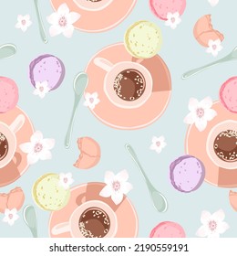 Seamless pattern with coffee, macarons, and flowers. Morning background for fabric, wrapping, textile, wallpaper, apparel. Vector illustration.