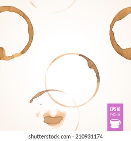 Seamless pattern of coffee stain. Isolated On White Background. Brown circles.