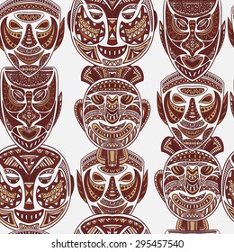 seamless pattern with collection of Tribal mask. Retro hand drawn vector illustration