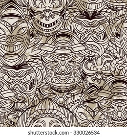 Seamless pattern with collection of Tribal mask. Retro hand drawn vector illustration