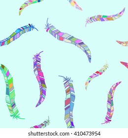 Seamless pattern of the color feathers on the blue background. Vector vintage hand drawn illustration in bohemian style. Image for textile, fashion, wrapping paper, fabric, web design, wallpaper.