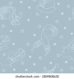 Seamless pattern. Color hand drawn illustration of winter hats, scarves, boots, felt boots, mittens. New Year and Christmas items. Handwritten graphic techniqe