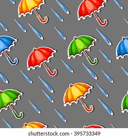 seamless pattern of color umbrellas and drops