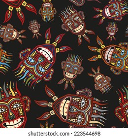 Seamless pattern of colored African masks, arranged randomly on a black background.