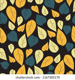 Seamless pattern with colored autumn leaves in vector