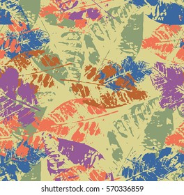 Seamless pattern with colored autumn leaves