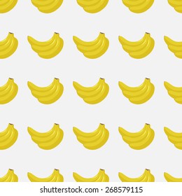 Seamless pattern of colored bananas on white background