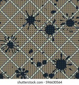 Seamless pattern. Colored blots on a plaid background. Grungy textiles. Wallpaper for children. Flat. Cartoon.