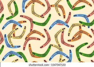 seamless pattern with colored boomerangs and inscription karma