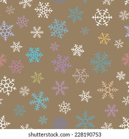 Seamless  pattern of colored bright snowflakes on a dark background