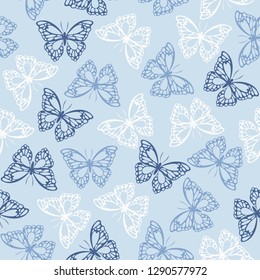 Seamless pattern with colored butterflies. Vector illustration.