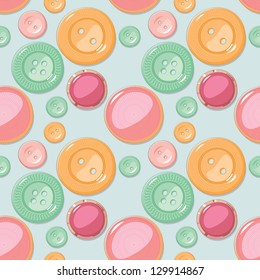 Seamless pattern of colored buttons on green