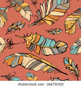 Seamless pattern of colored feathers, vector pattern. 