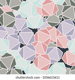 Seamless pattern. The colored figures composed of triangles are scattered chaotically.