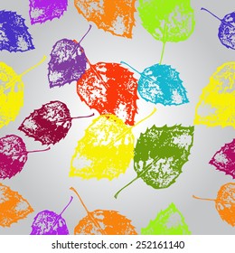 Seamless pattern of colored floral motif, autumn leaves  on a  gradient gray  background. Hand drawn.