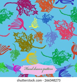 Seamless pattern of colored floral motif, maple leaves. Hand drawn.