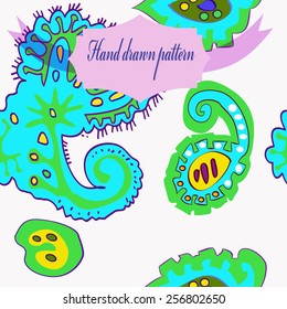 Seamless pattern of colored floral motifs, label on a white   background. Hand drawn.